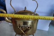 Antique Brass Tilting Kettle on Stand.