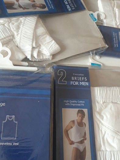 MEN BRIEFS. NEW PANTS. SIZES MEDIUMS are 6 packets and 1 large packet. 2 pants per packet. Total is 14 pant briefs. 2 euros each packet. All for 11 euros.