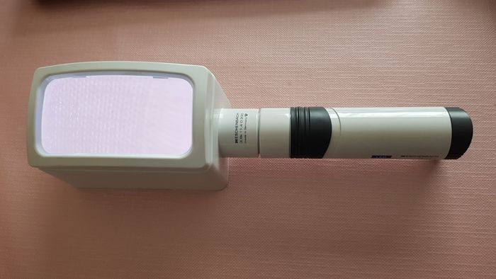 Magnifier with light. Eschenbach