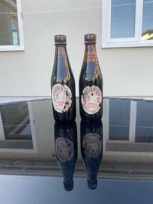 Pair of old Smithwicks 1/2 Pint Bottles - FULL