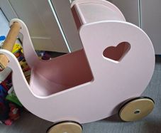 moover pink wooden pram