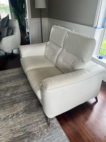 White Leather sofa and foot stool