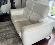 White Leather sofa and foot stool