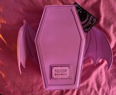Killstar pink coffin winged backpack
