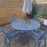 cast iron table and 4 chairs Image 2