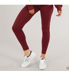 Brand new burgundy leggings size 12