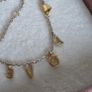 Pandora chain bracelet with gold yellow plated hearts, and dangle letters spelling LOVE adjustable closure with three length options: 16 cm, 18 cm, and 20 cm. In good condition few signs of wear. Image 7