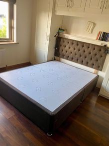 Bed base with storage drawers and headboard