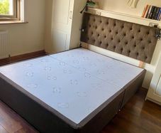 Bed base with storage drawers and headboard