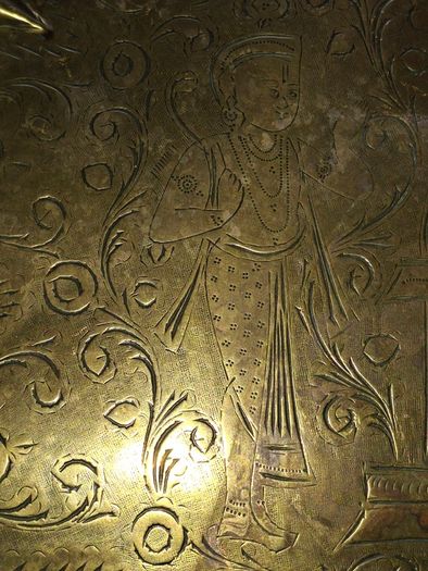 Antique Brass Charger Tray Hand-Engraved Mughal court figures. The Charger has a distinct Scalloped edge and is heavily decorated. Similar items often date from the late 19th century, specifically around the 1870s or 1880s