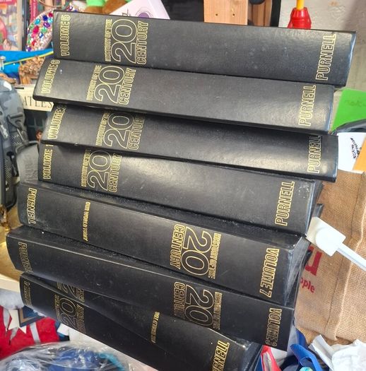 vintage stack of History of the 20th Century bound volumes published by Purnell in the late 1960s and 1970s