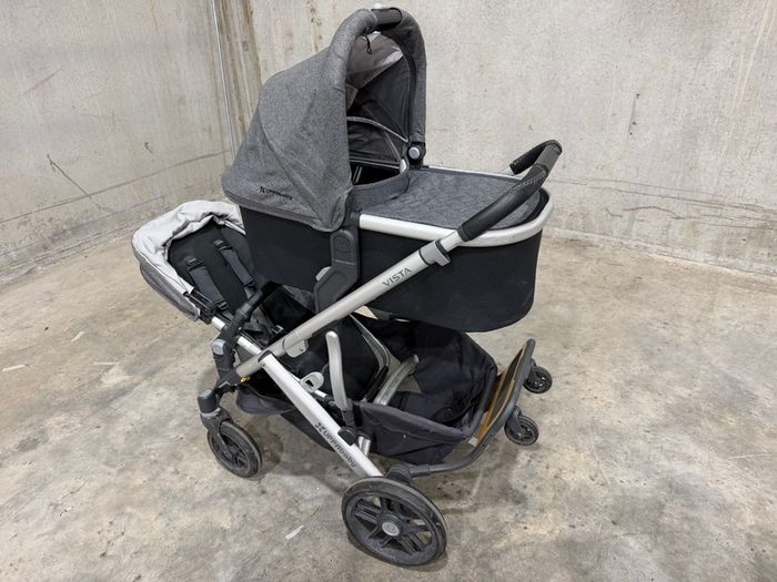 Uppababy Vista twin buggy and three Joie car seats
