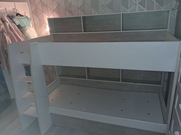 Bunk beds with integrated shelving