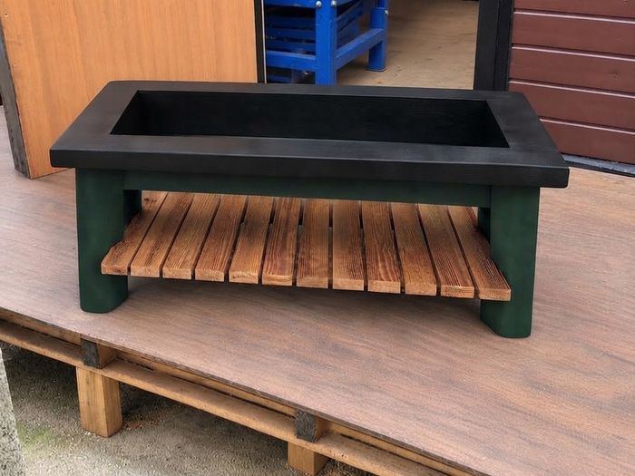 Large garden planter with display shelf