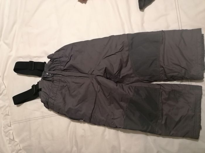 Young boys ski jacket and salopettes