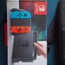 Nintendo switch in box with acceseries and game Image 8