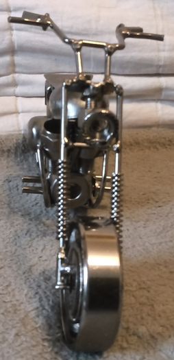 White metal made motor bike