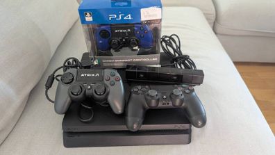PlayStation 4 Slim 1Tb+ 1x Original Wireless Controller+ 2x Wired Controller+ Camera