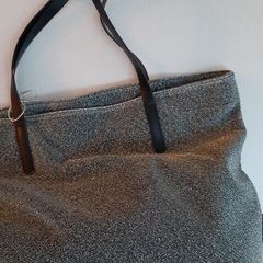 new silver bag tag attached