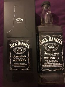 Jack Daniels whiskey empty bottle and box