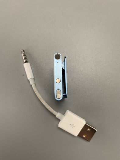 Apple iPod Shuffle 4th Generation, a small, portable MP3 player