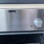 Kitchen including integrated dishwasher and cooker Image 7