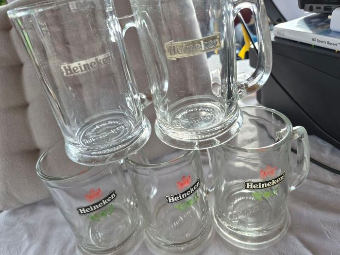 5 Vintage Heineken 1/2 pint, glass beer tankards/mugs.