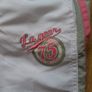 3/4 length White Shorts.   Age 9-10 Image 2