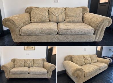 Beige damask floral upholstery couch