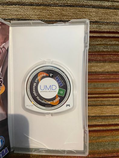 PSP  Console plus 10 games, charger and headphones