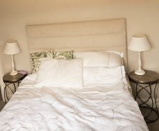King size bed + headboard + mattress + bedside tables + lamps