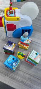 Little Tikes Story Dream. Lots of extra stories included.