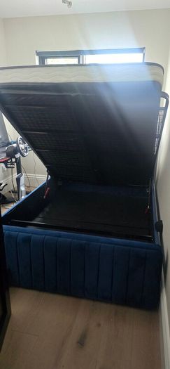Double bed ith storage plush blue/mattress included bought at xmas too big for room