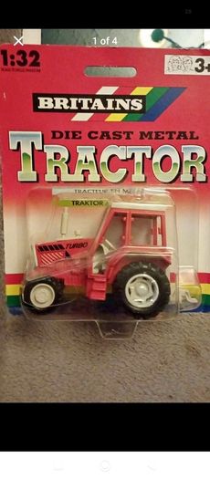Vintage British diecast Tractor model ..the red turner