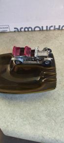 Vintage ashtray featuring a Lesney matchbox car Made In England