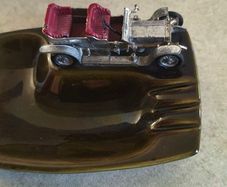 Vintage ashtray featuring a Lesney matchbox car Made In England