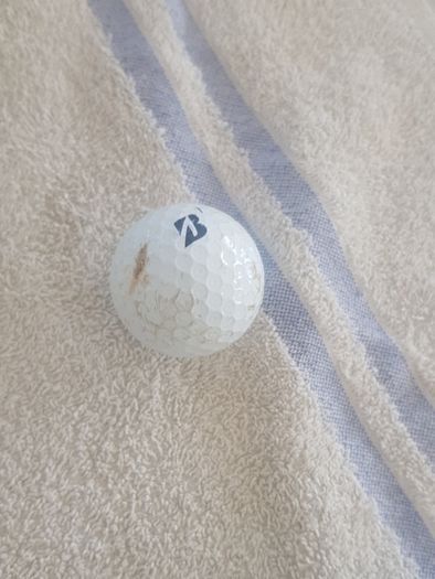 golf ball and tees