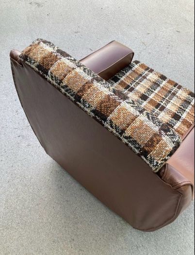 Vintage 1970s armchair on castors.