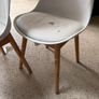 Two white bucket chairs Image 3
