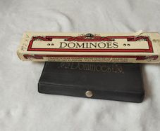 Dominoes in black case & House of Marbles