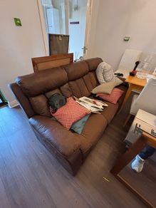 Sofa seats three and separate armchair