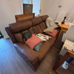 Sofa seats three and separate armchair