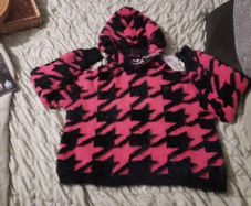 pink and black fluffy fila hoody