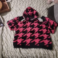 pink and black fluffy fila hoody