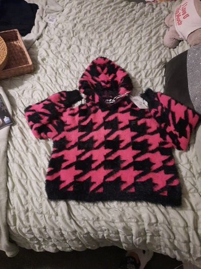pink and black fluffy fila hoody