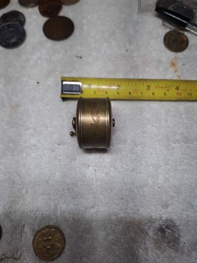 Antique fly fishing reel shaped tape measure