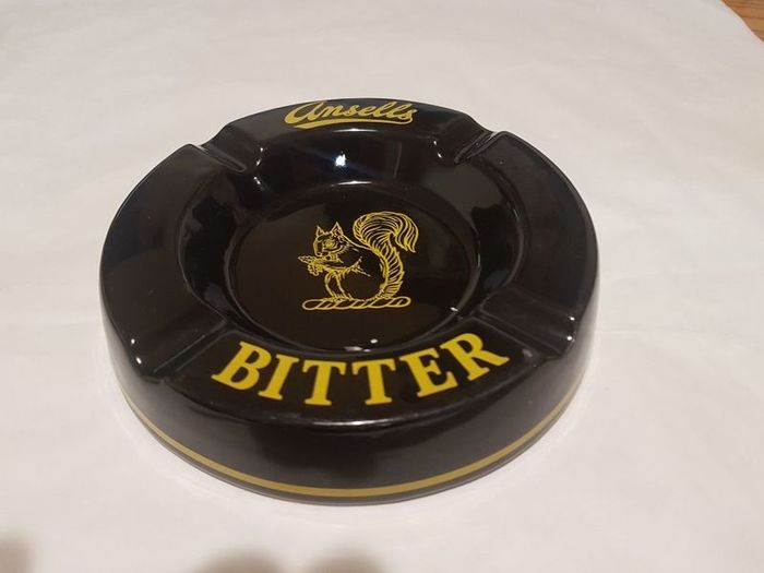 ansells bitter ceramic ashtray ,prefect condition, collectors item,,price includes post to anywhere in ireland thank you, hard to come by
