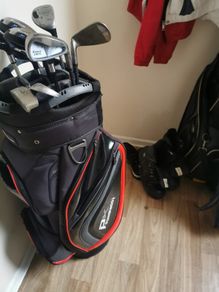 random golf clubs and bag