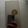 Xiaomi 14T phone with earbuds Image 5