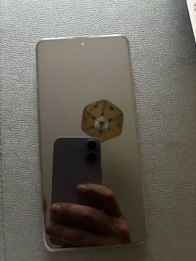 Xiaomi 14T phone with earbuds